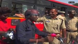 Karnataka police offer roses to traffic rule followers
