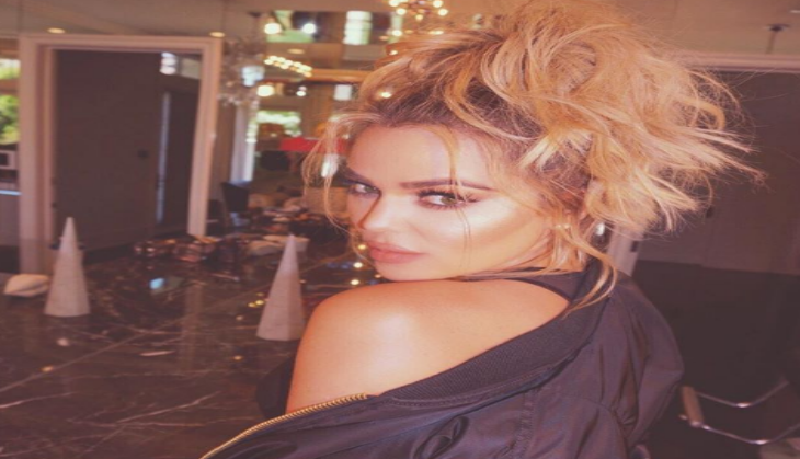 Pregnant Khloe Kardashian slave away in kitchen for Thanksgiving dinner