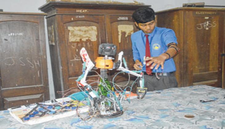 Manipuri student makes robot with discarded household items
