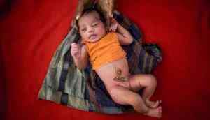Born in a limbo: This photographer is set to show the statelessness of Rohingya newborns