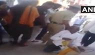 Cop suspended for dragging a devotee