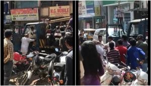 This shameful act of traffic police officer slapping a senior citizen will make you angry; see video