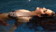  Ameesha Patel shares sizzling pictures in bikini; gets slut shamed