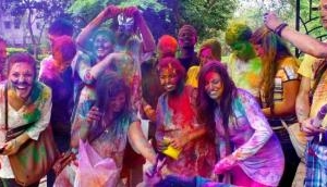 Colour-smeared people celebrate Holi across nation