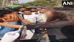 Delhi: Woman manhandles eve teaser for passing lewd comments