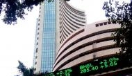 Equities trade flat-to-negative on negative global cues 