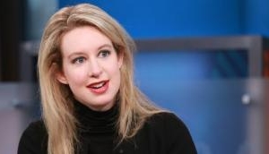 Theranos founder and Indian-American former president charged with 'massive fraud' 
