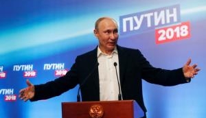 Vladimir Putin wins presidential elections