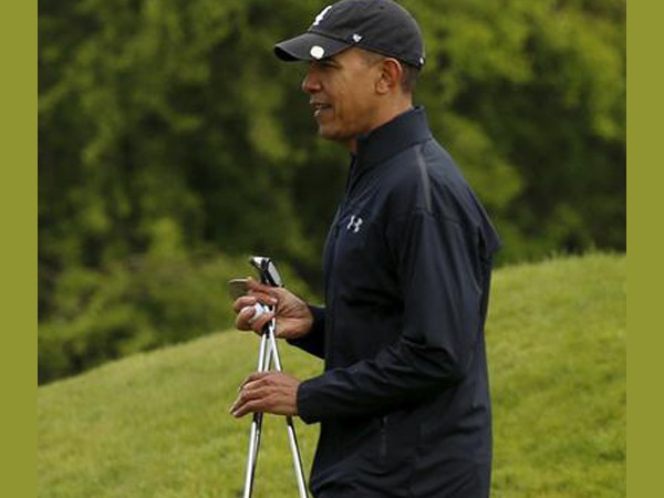 Former NZ PM beats Obama in extra holes