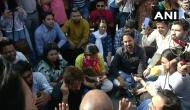 JNU students and Journalists protesting at Delhi police headquarters against manhandling and lathi charge