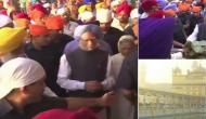 Manmohan Singh pays obeisance at Golden Temple