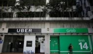  Uber to sell Southeast Asia business to Singapore-based rival Grab