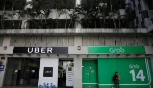  Uber to sell Southeast Asia business to Singapore-based rival Grab