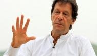 Belligerent Imran says Pak PM trying to save Nawaz Sharif