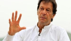 Belligerent Imran says Pak PM trying to save Nawaz Sharif