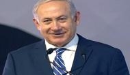 Israel election: Exit polls show Benjamin Netanyahu behind main rival Gantz