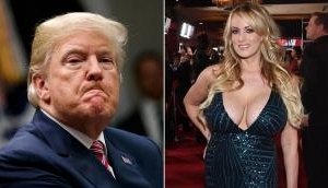 ‪‪Donald Trump denies knowing anything about $130,000 payment made to ‪Stormy Daniels‬ by ‪Michael Cohen‬‬