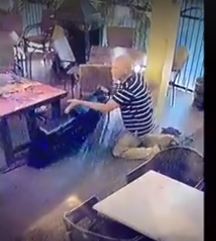 He tried to steal TV from pizza restaurant. Watch what happened next: