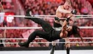 ‪WrestleMania 34 2018: ‬Brock Lesnar‬ knocks down ‪Roman Reigns‬ and retains WWE Universal Championship‬‬