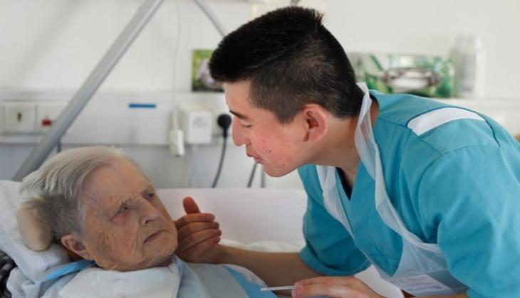 Zia Hayafi with a Patient