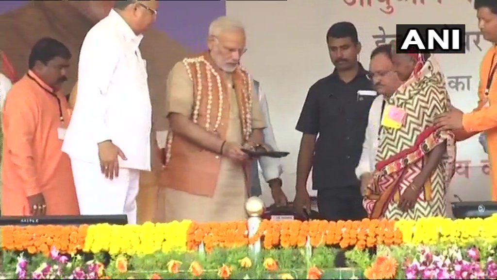 PM Modi presents pair of slippers to tribal woman