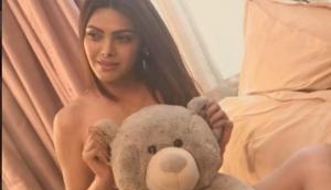 OMG! Sexy diva Sherlyn Chopra goes sans clothes for a steamy hot photoshoot; videos goes viral