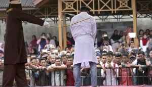 Sharia law: College students whipped in public for allegedly having sex in Indonesia