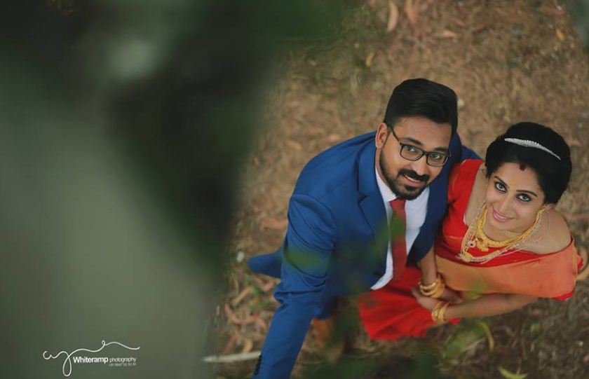Hilarious! Kerala photographer, Vishnu hung upside down to capture the perfect wedding photograph 