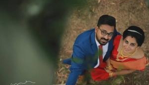 Hilarious! Kerala photographer, Vishnu hung upside down to capture the perfect wedding photograph 