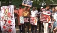 BJP workers demonstrate outside Rajnath Singh's residence