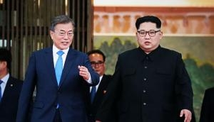 Kim, Moon shake hands and put an end to the war