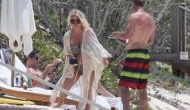 Jessica Simpson shares a sexy selfie in leopard print bikini with husband Eric Johnson‬‬ 