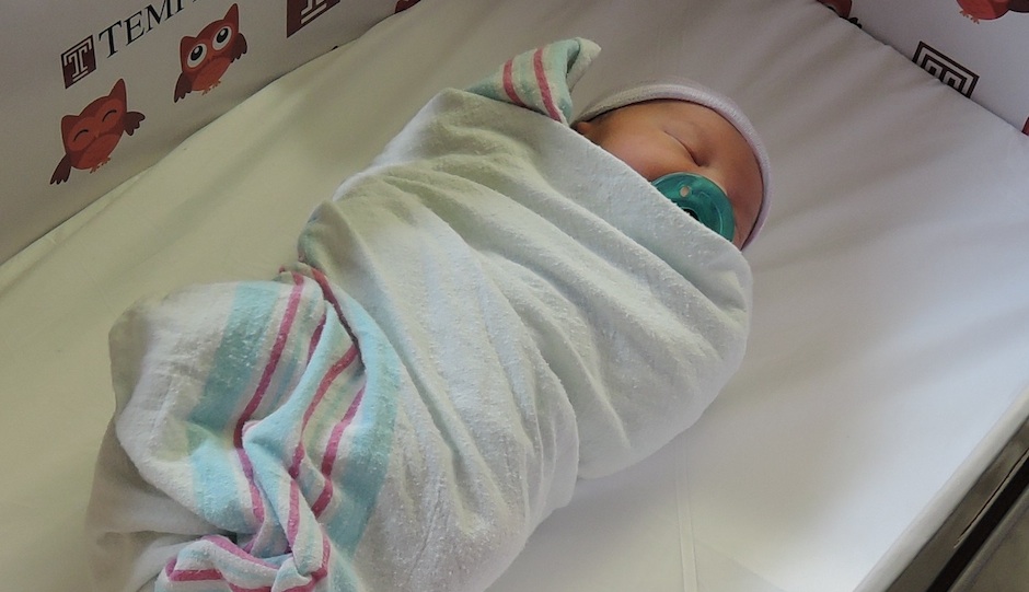 Baby found in a box in Jakarta, parents plead in letter to take care 