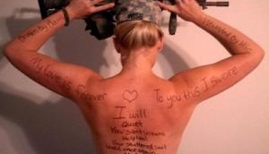 How women once got naked and wrote poem on their back to raise awareness about PTSD to support their husband