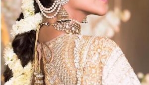 Sonam Kapoor looks radiant in golden lehenga at her Mehndi ceremony