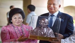 Malaysian Prime Minister Mahathir bans predecessor Najib Razak from leaving country over involvment in 1MDB scandal