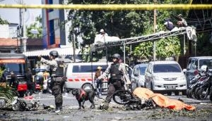CCTV footage reveals Indonesia suicide bombing carried out by family including 8-year-old girl