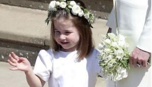  Watch Royal Wedding: Princess Charlotte is a 'show stopper', waves off as Prince Harry and Meghan Markle depart church in carriage