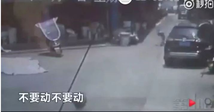 Viral Video: Man runs to save girl falling from building in China