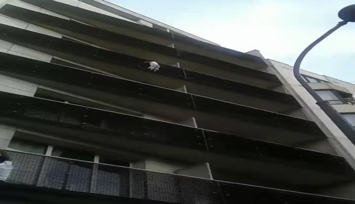 Man Climb on Building