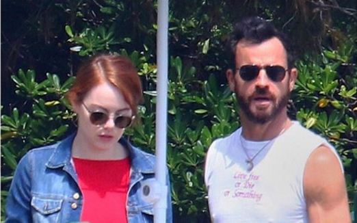Justin Theroux shows off his abs while Emma Stone wears sexy red swimsuit in France