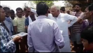 Caught on camera: BJP leader threatens govt employee