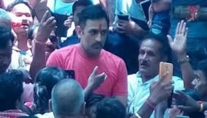 MS Dhoni goes to temple to pray after winning the IPL title