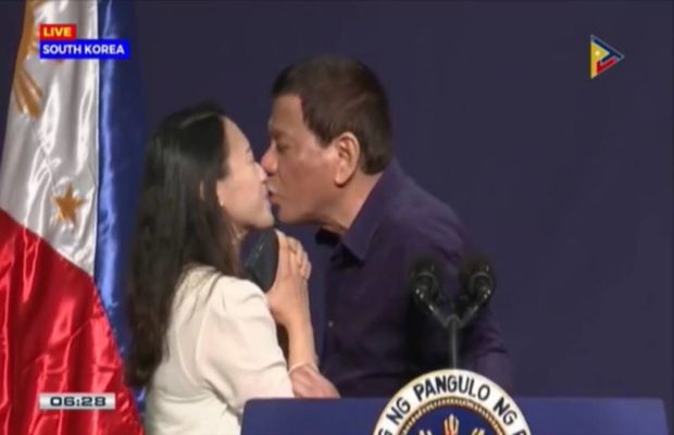 Philippines President who abused Trump now kissed a women on stage for a book 