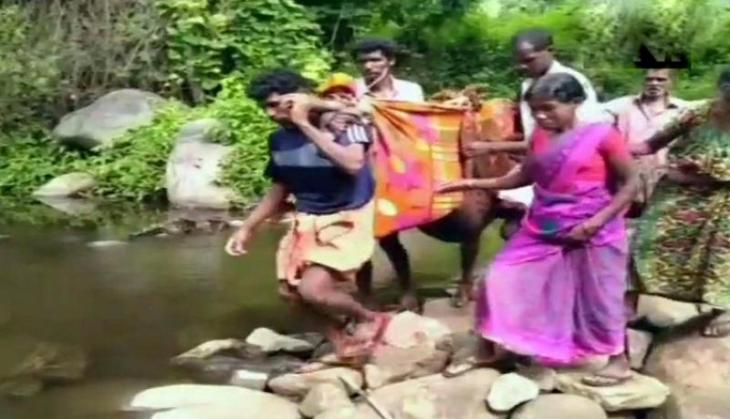 Shame! No ambulance, pregnant woman carried for 7 kms to hospital on a stretcher made from blanket in Kerala