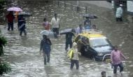 Mumbai police constable emerges 'hero' after standing in harsh rain and wind to manage the traffic; see picture; video inside