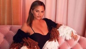 Chrissy Teigen posts about her 'Milky Breast' on social media after welcoming son Miles