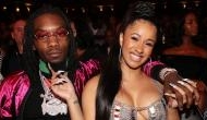  Offset kiss Cardi B's baby bump in her semi-naked pregnancy photoshoot for Rolling Stone cover