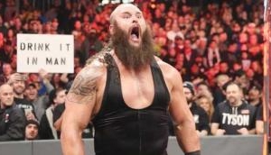 Braun Strowman's girlfriend tie his shoelaces as he cannot bend down