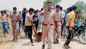 Hapur Lynching: UP cops say 'sorry' after viral photo shows Muslim man being beaten up and dragged in personnel' presence